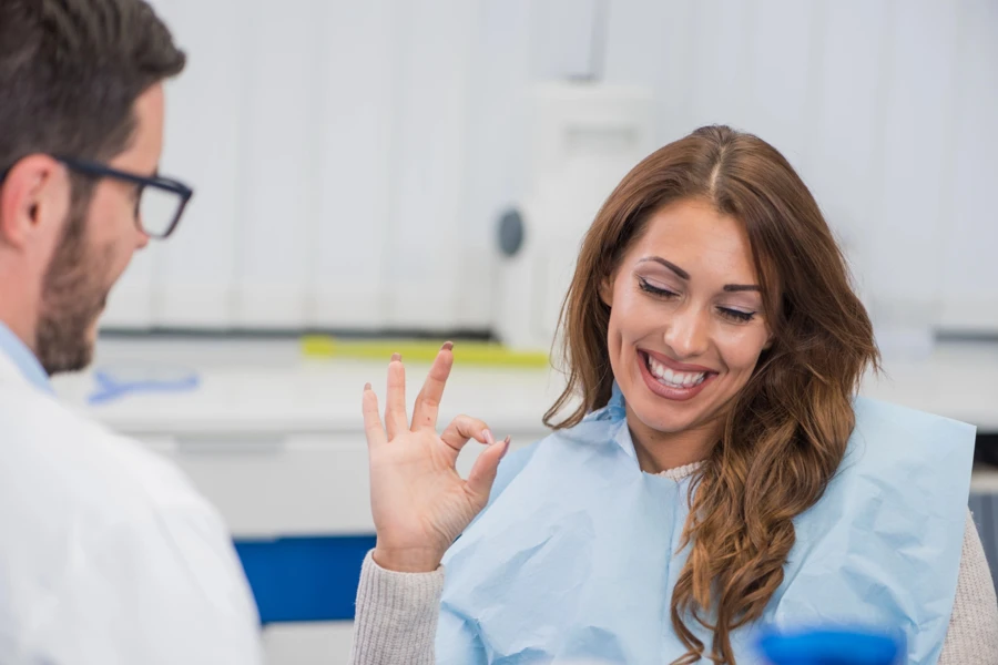 happy dental patient approval